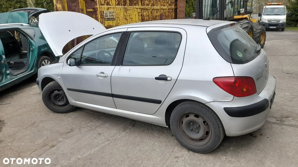 PEUGEOT 307 błotnik lewy przedni   EZR