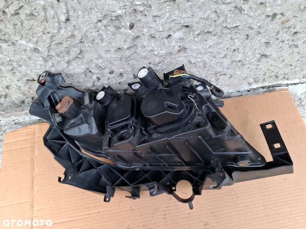 LAMPA PRZEDNIA LEWA BMW E90 E91 05/08r - 8