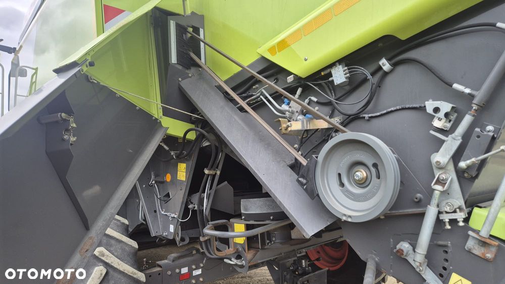 Claas Lexion 660 z hederem - 11