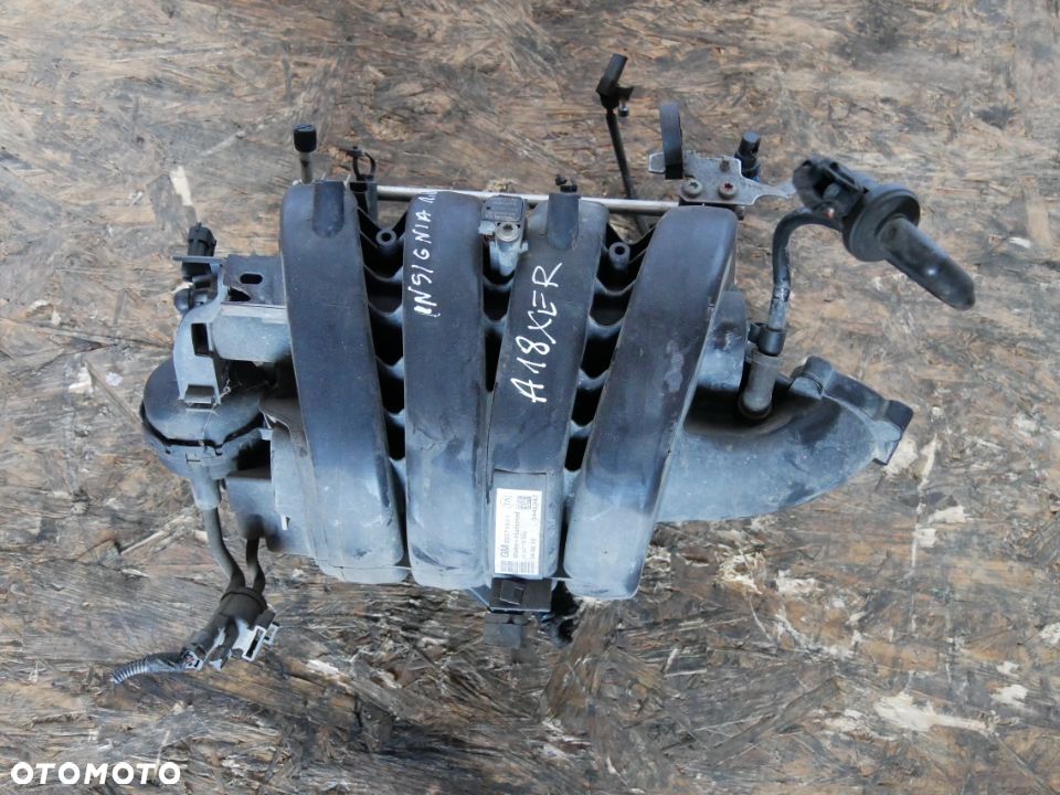 KOLEKTOR SSĄCY OPEL INSIGNIA 1.8B A18XER 55571524 - 1