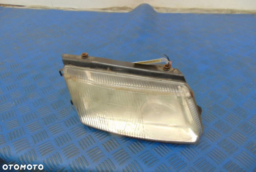 VOLKSWAGEN PASSAT B5 REFLEKTOR PRAWY STAN WIDOCZNY NA ZDJĘCIU - 1