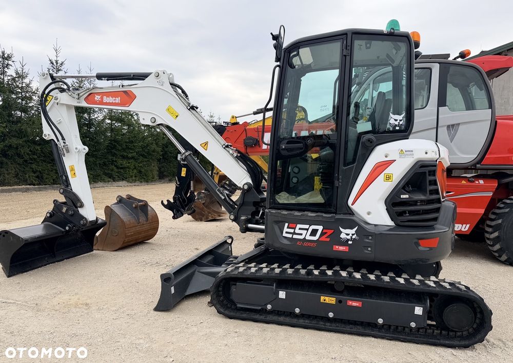 Bobcat Minikoparka Bobcat e50Z 5ton e55 e60 Cat 303.5 304  305 3xłyżki Ramię LOONG dodatkowe linie hydr wyjścia AUX1 + 2 przeciw waga MAX-dociążenie gąsienice 85% od nowości 1 właściciel z Niemiec Auto IDLEE po serwisie Widły wiertnica grabie i inne za dopłatą Szybkozłącze hydr Miller łyżka przedsiębierna Pług  Kubota Takeuchi Jcb - 2