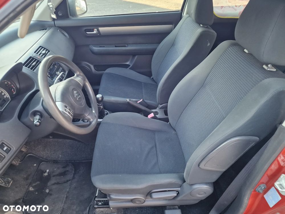 Suzuki Swift 1.3 Club - 11