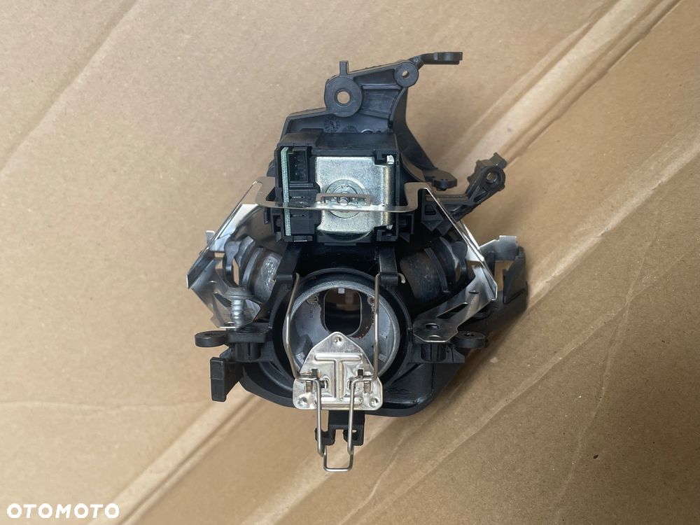 62611913 Soczewka lampy xenon bmw e90 e91 - 4