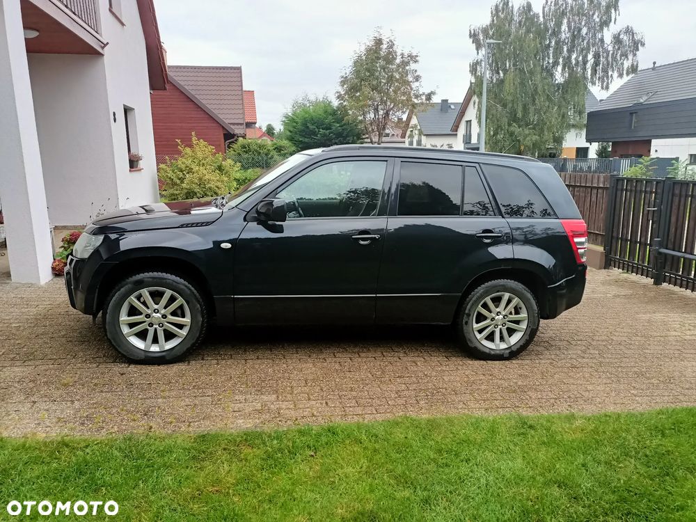 Suzuki Grand Vitara 2.0 - 12