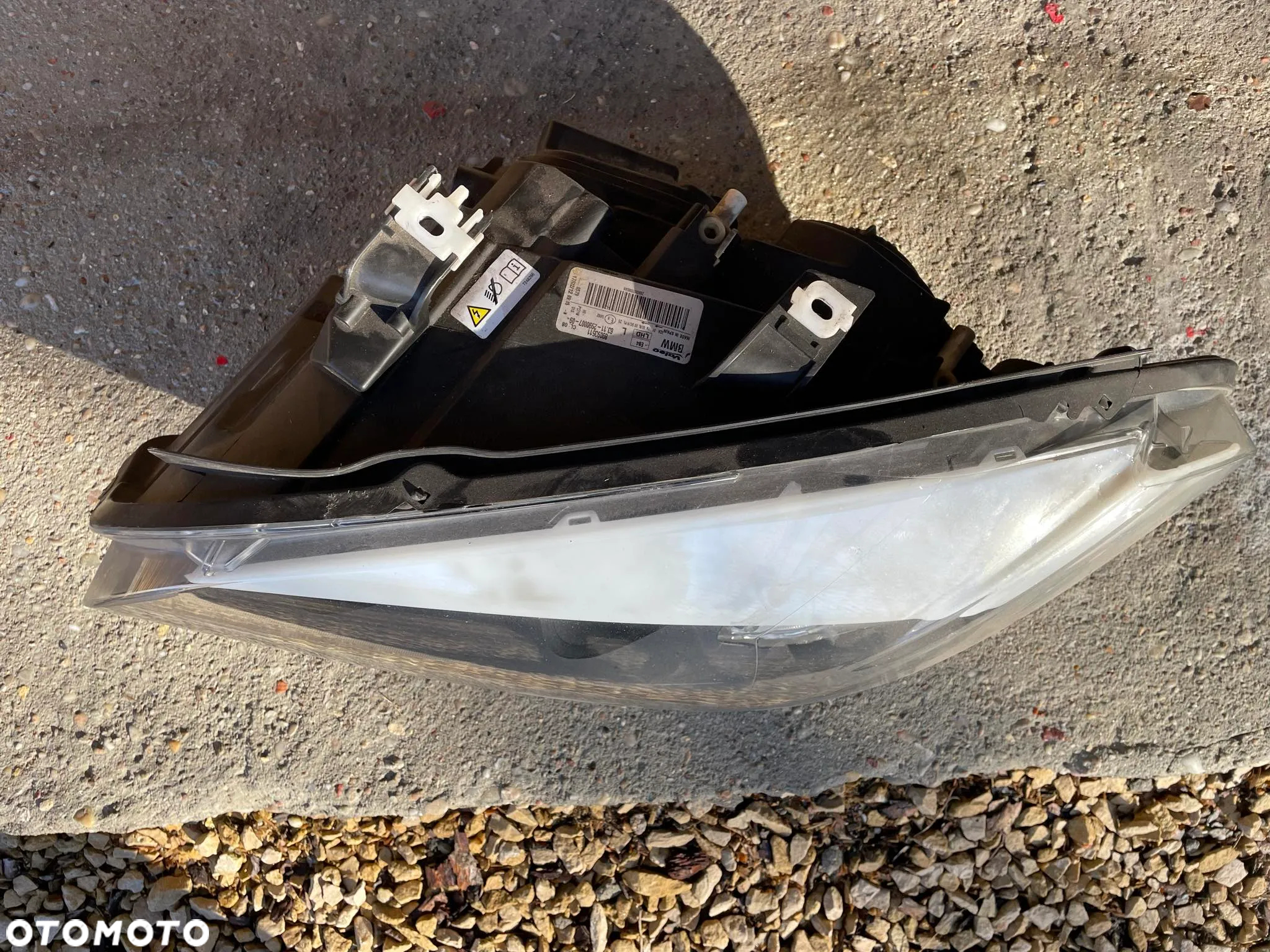 Lampa przednia lewa BMW X1 E84 lift 2009 - 2015 - 2