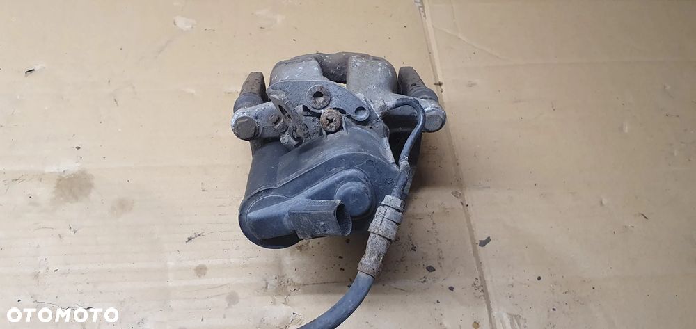 Zacisk hamulcowy lewy tył tylny lewy VW Passat B6 - 3
