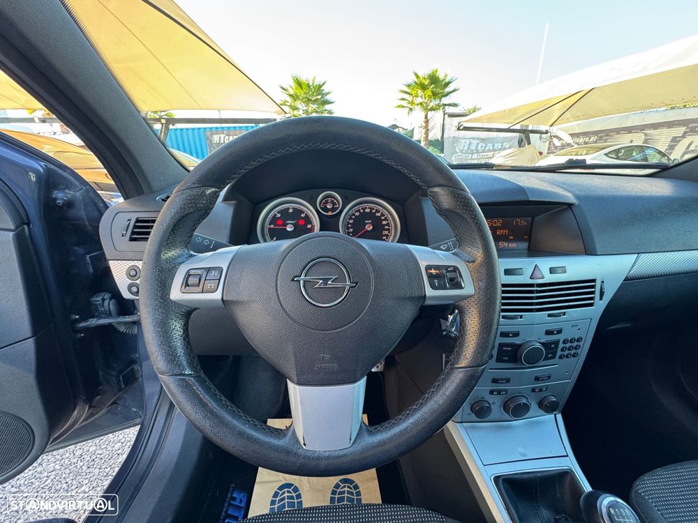 Opel Astra GTC 1.3 CDTi - 11