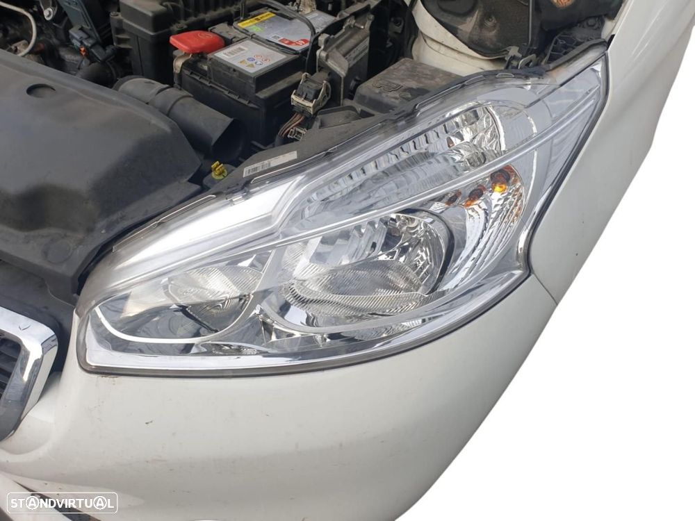 FAROL ESQUERDO PEUGEOT 208 - 1