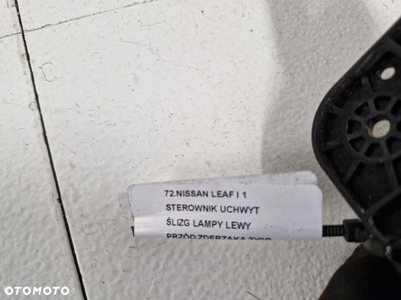 NISSAN LEAF I 1 STEROWNIK UCHWYT ŚLIZG LAMPY LEWY PRZÓD ZDERZAKA 3Y0B - 5