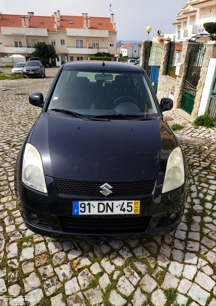 Suzuki Swift 1.3 DDiS GL - 1