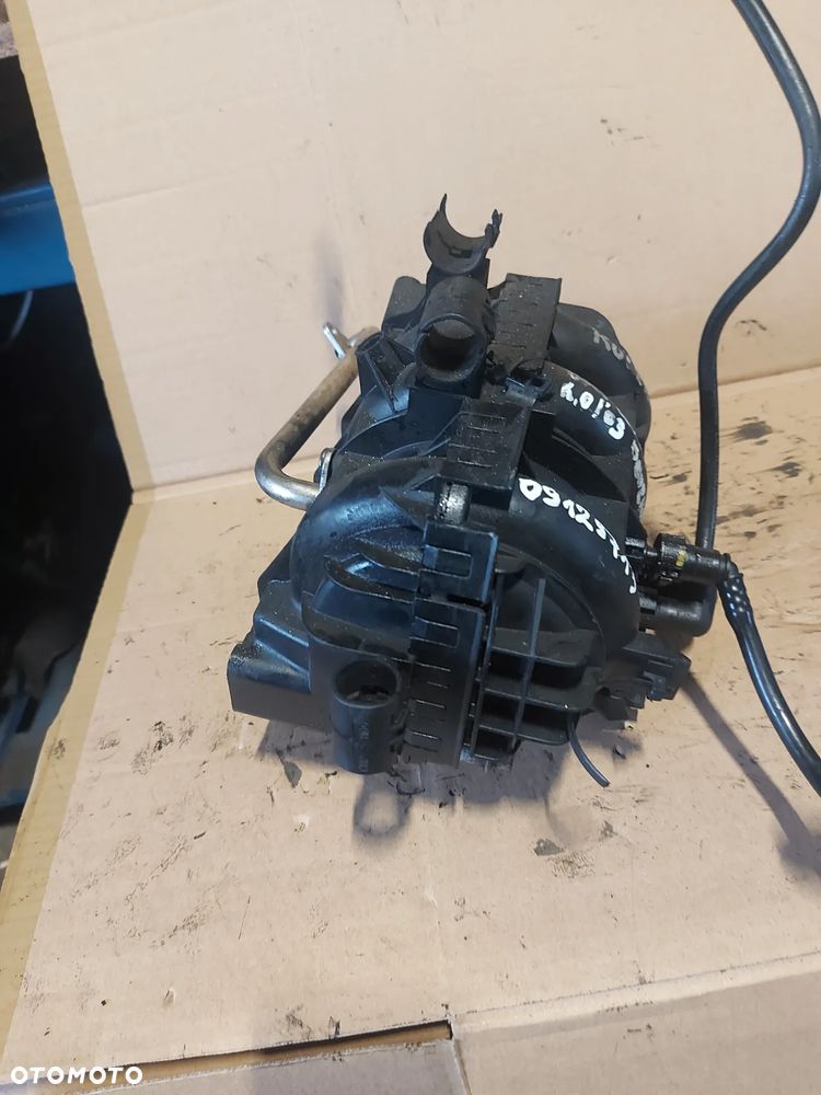 Kolektor ssący Opel Corsa C 1.0b '03r 09129713 - 2