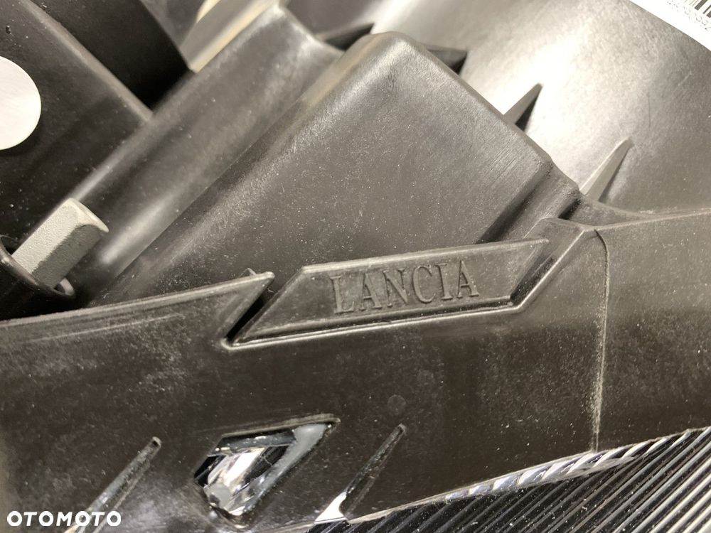 NOWA ORYGINALNA LAMPA LAMPA LEWA PRZEDNIA LEWY PRZÓD LANCIA DELTA 08-14 51876348 - 9