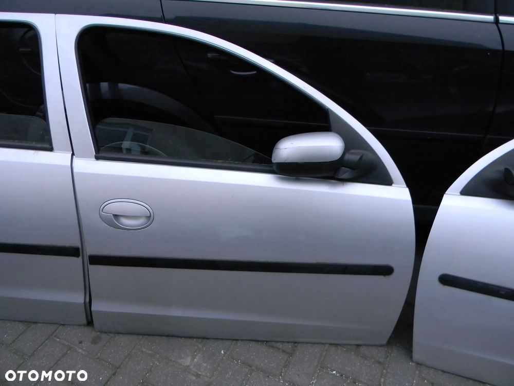 drzwi lewe prawe tył przód OPEL CORSA C Z147 5D - 10