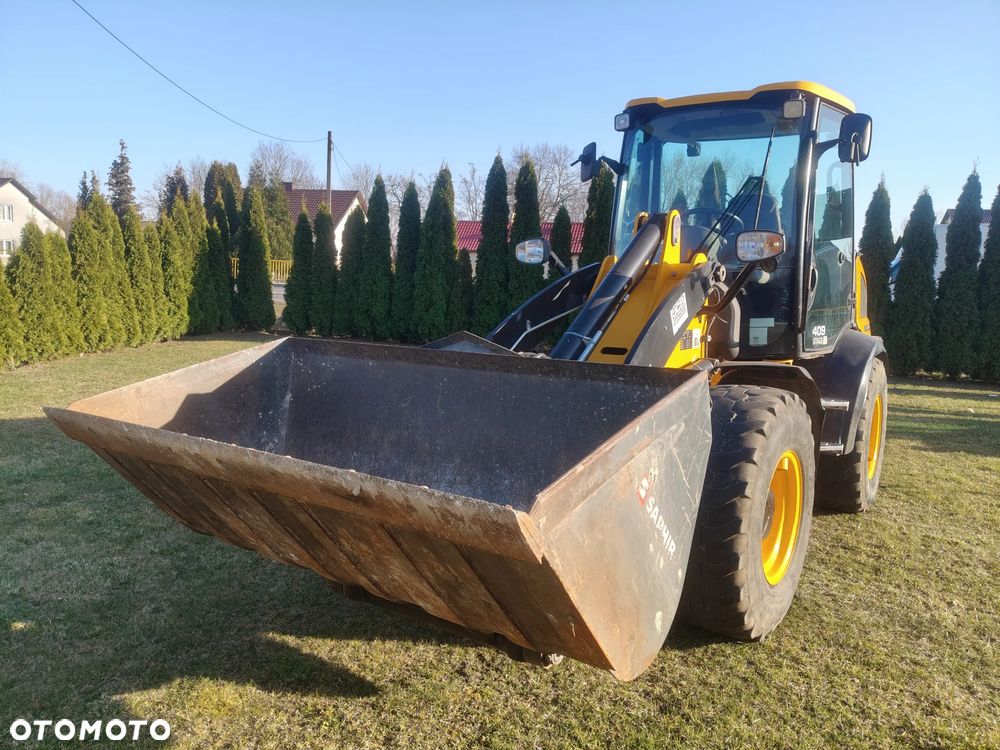 JCB 409 - 1