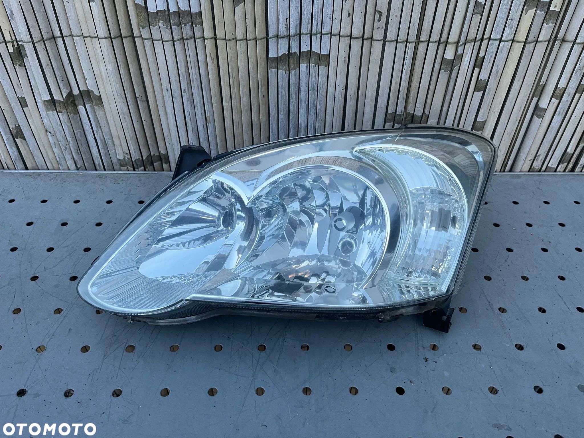 Toyota Corolla E12 lift lampa przednia lewa - 1