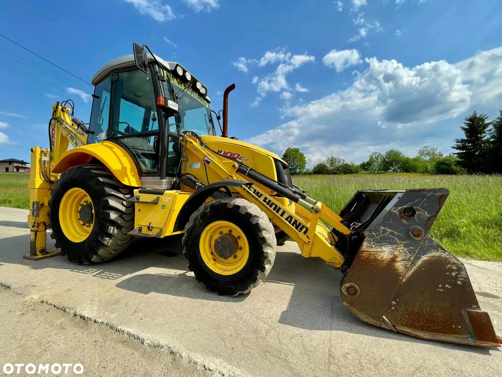 New Holland B100C** KOPARKO ŁADOWARKA NEW HOLLAND B100C** JOYSTICK** LEASING* ZAMIANA* SKUP* ROK 2015* - 2