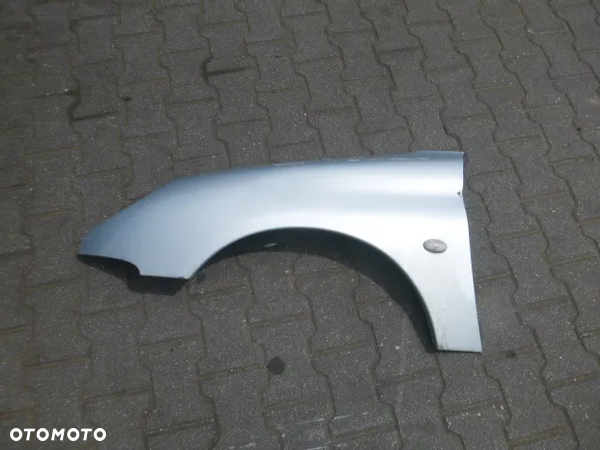 BŁOTNIK LEWY PRZÓD LEWY PRZEDNI PEUGEOT 206 EYLC