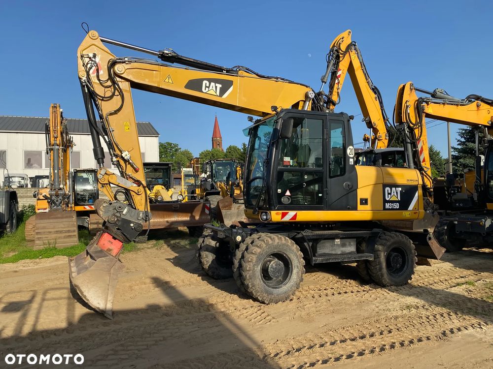 Caterpillar CAT M315D, 7000 MTH, 2014 ROK, Z NIEMIEC, SUPER STAN - 5