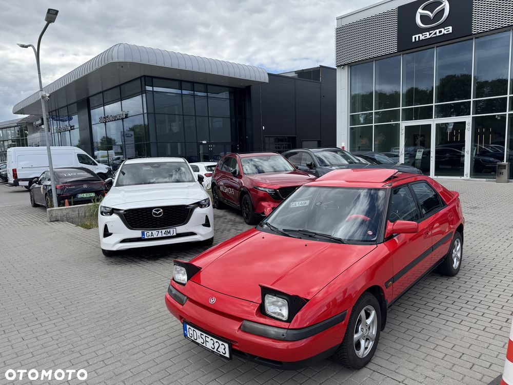 Mazda 323F - 14