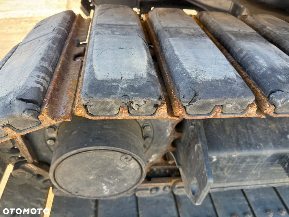 Caterpillar 310 - 26