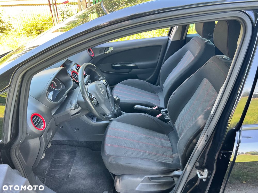 Opel Corsa 1.4 16V Cosmo - 9