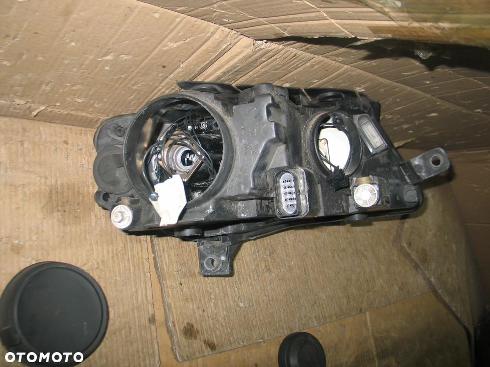 lampa przod vw passat B6 05-10r. 3C0941005S Europa - 15