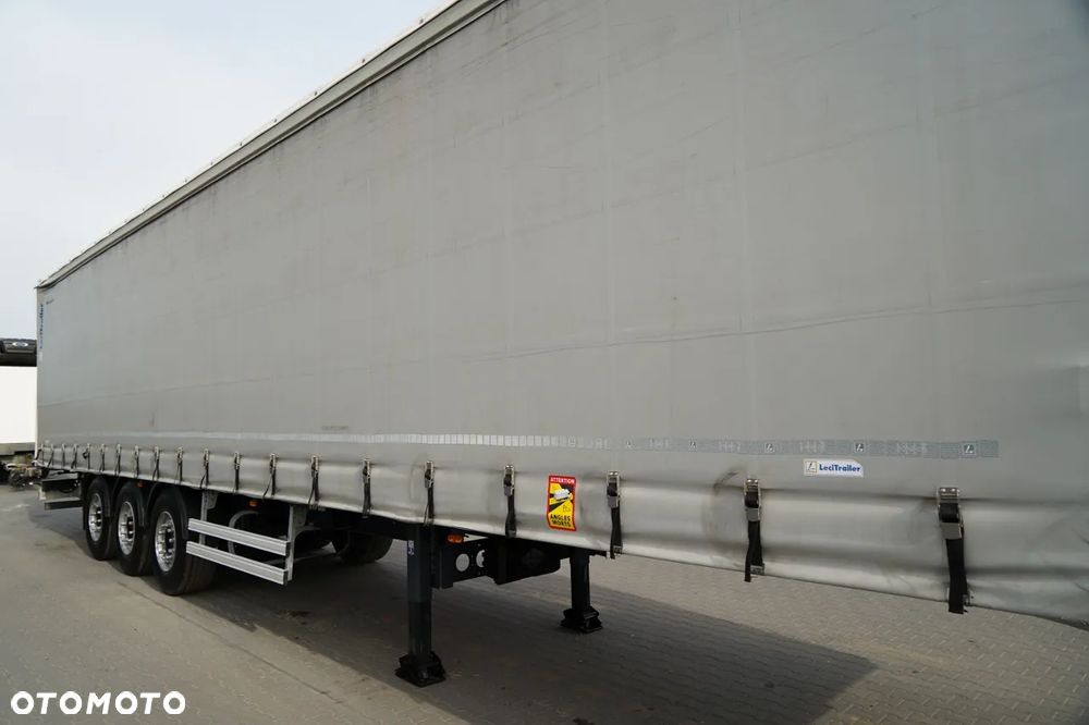 LeciTrailer FIRANKA / STANDARD / MOCNA PODŁOGA SZYNA DESKA / OŚ PODNOSZONA / OPONY 100%  / OSIE SAF - 11