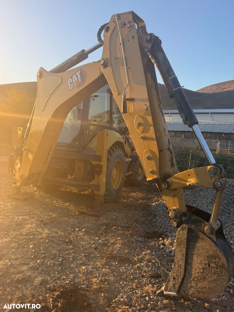Caterpillar 428 - 5