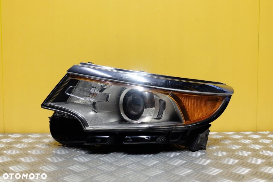 FORD EDGE 2010- REFLEKTOR LAMPA ZWYKŁA SOCZEWKOWA LEWA USA - 1