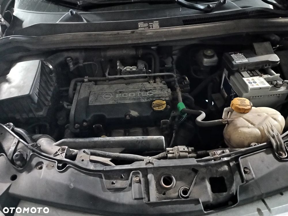 Opel Corsa 1.2 16V Enjoy - 23