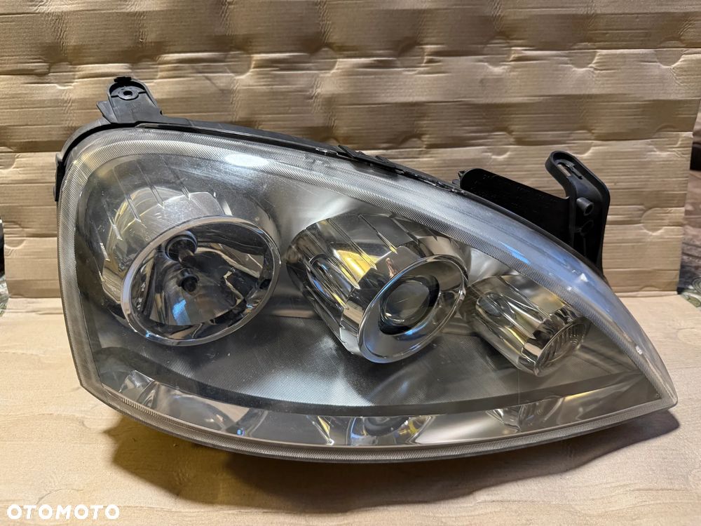 Lampa Opel Corsa C lift 13100536 prawa 13100535 lewa OE - 5