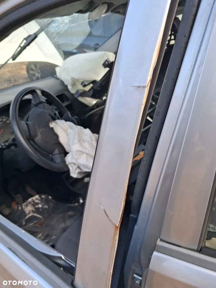 Daihatsu cuore 03 drzwi lewy przód E28 - 4