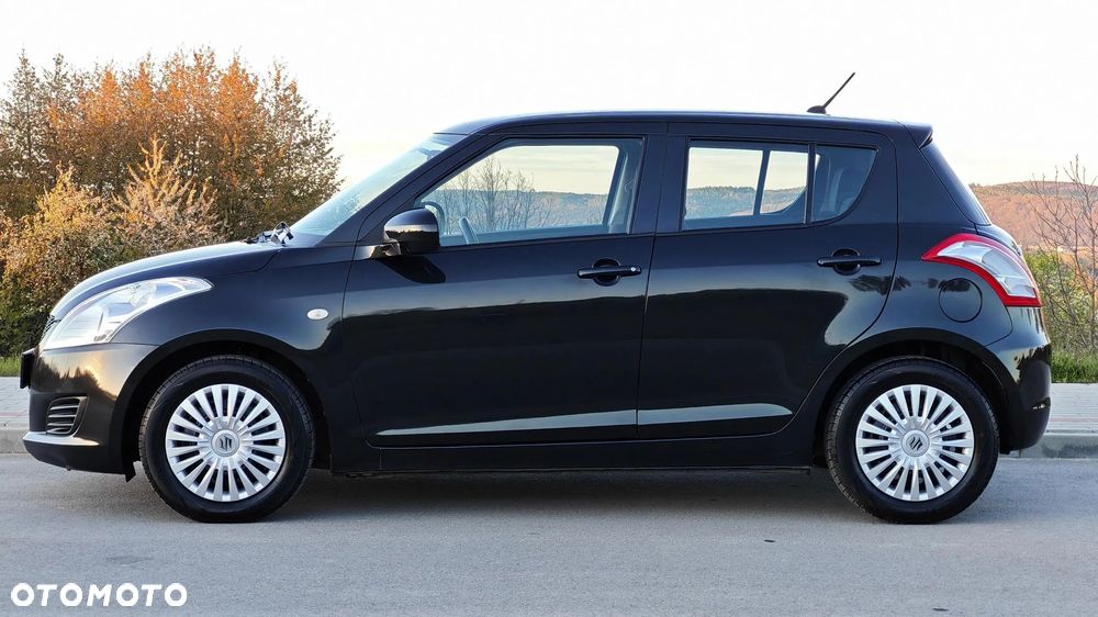 Suzuki Swift 1.2 Club - 11