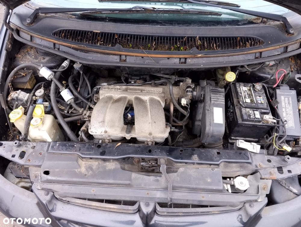 Chrysler Voyager / Town & Country (95-00r.) 2.4 B 149KM. Silnik EDZ Skrzynia DD3 lakier PAW/VAW/QAW - Dark Slate Pearl.Cały na części. GWARANCJA !!!  Przód Tył Zestaw Komplet Drzwi Klapa Zderzak Błotnik Maska Grill Atrapa Szyba Pas Lampa Lusterko Boczki Fotel Kanapa Kokpit Deska Rozdzielcza Przełącznik Włącznik Sterownik Przewody Wiązka Instalacja Moduł Komputer Czujnik Listwa Pompa Alternator Wtryski Głowica Rozrusznik Kompresor Sprzęgło Dwumas Silnik Skrzynia ABS Klimatyzacji Paliwa Wspomagania Kolektor Turbina Przepustnica Zawór Chłodnica Koło Hak Belka Sanki Zawieszenie Mcpherson Półoś Amortyzator Wydech Tłumik Zacisk Most - 11