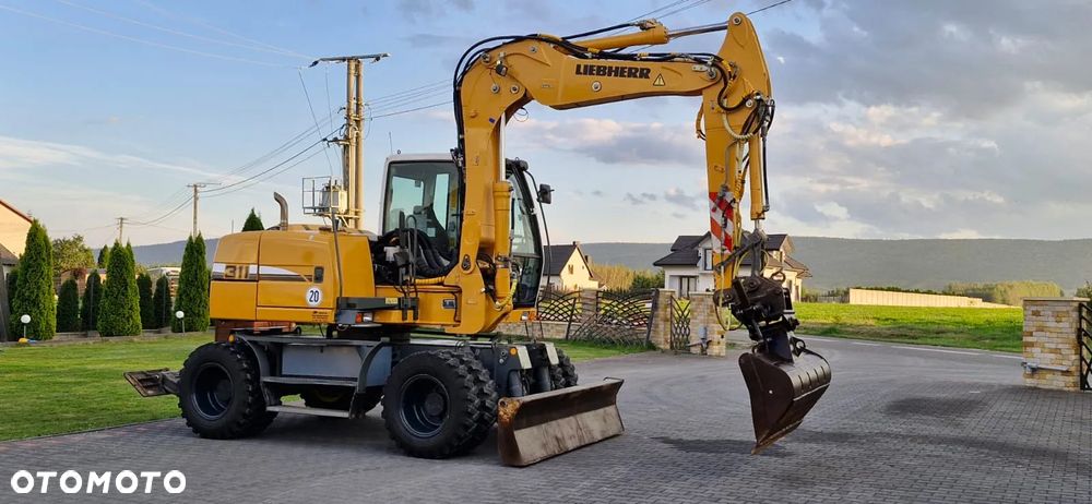 Liebherr A 311 Litronic/ Maszyna sprowadzona/ 8240H/ - 7