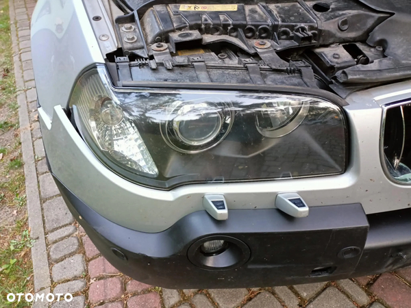 Lampa przód przednia prawa Xenon Dynamic skrętny BMW E83 X3 przed lift 3418414 Europa