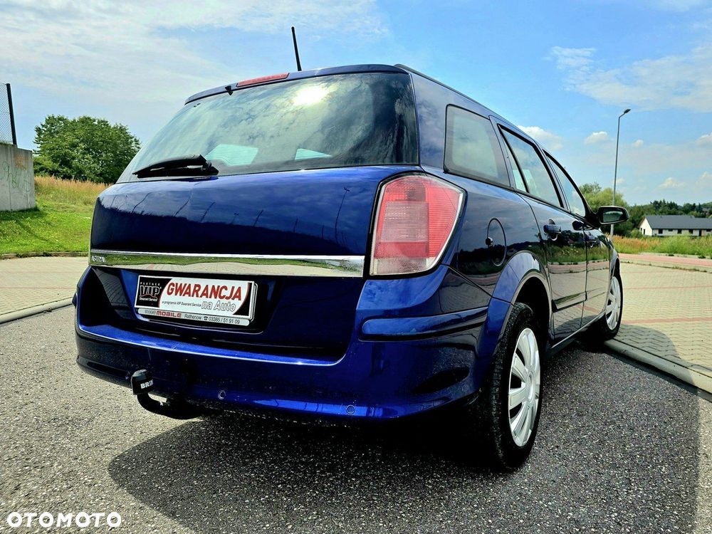 Opel Astra 1.8 Caravan Edition - 13