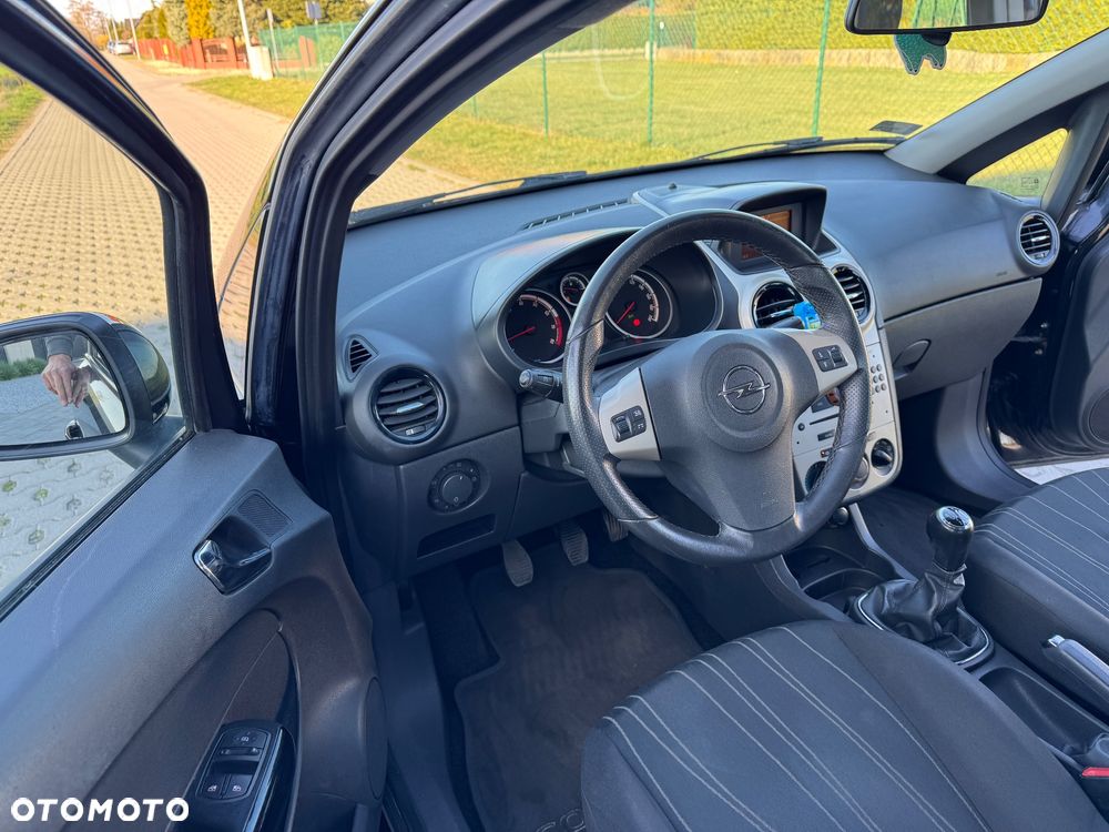 Opel Corsa 1.2 16V Cosmo - 7