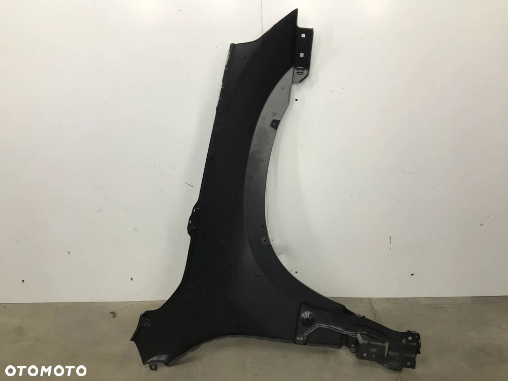 Błotnik Suzuki Grand Vitara 2 II 05-14r. lewy 57700-65810 - 9