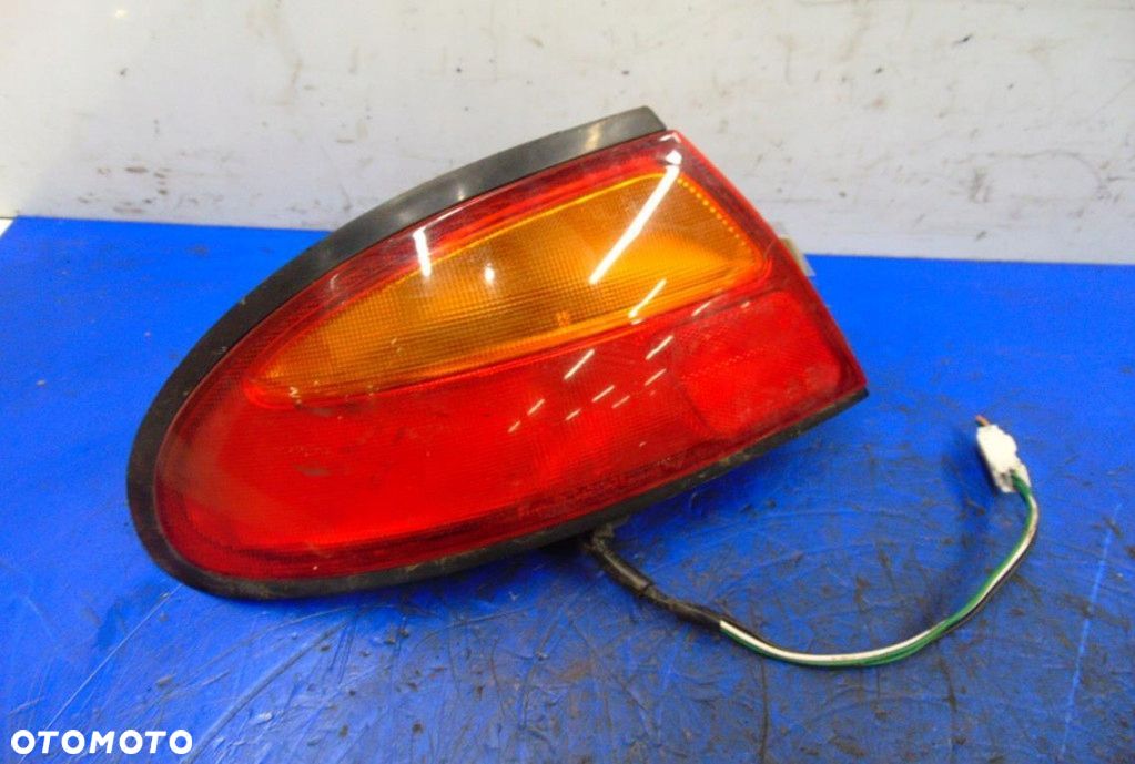 MAZDA 323 V LAMPA LEWY TYŁ - 1