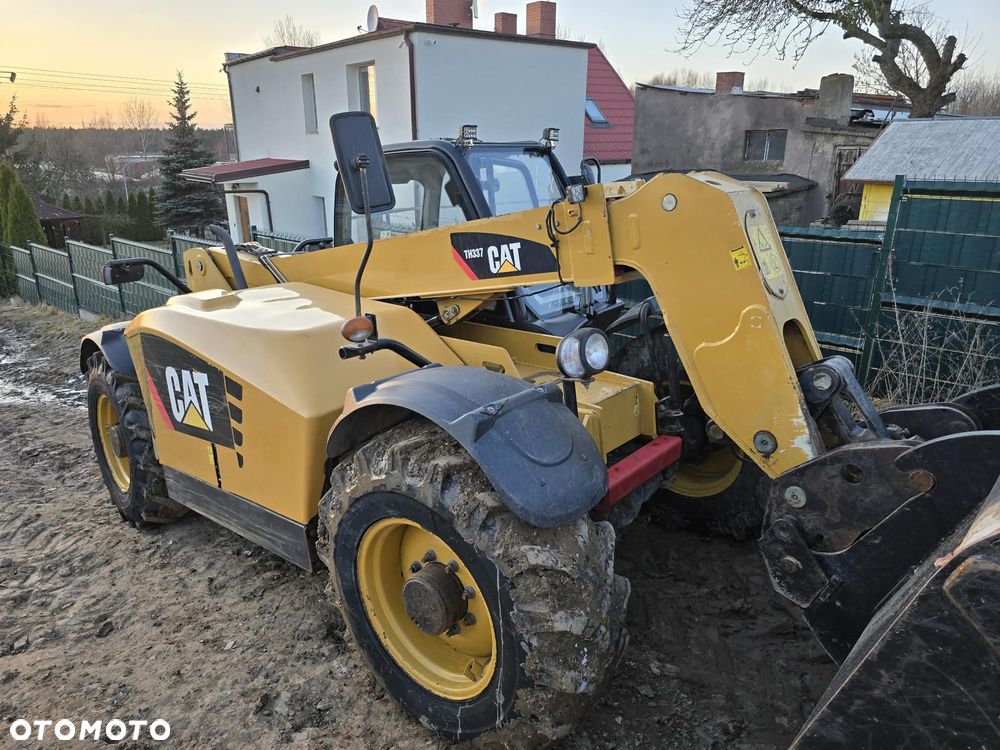 Caterpillar TH 337 AG  PREMIER 1WŁ SALONOWY - 8
