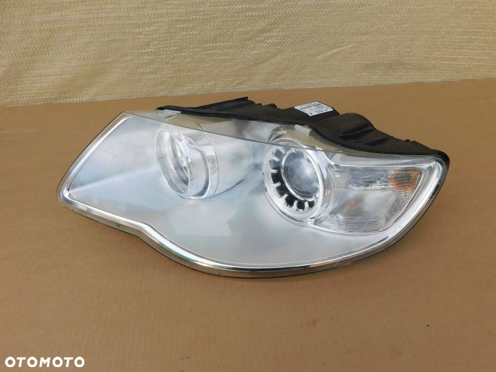 Lampa przód lewa przednia VW Touareg 7L lift 07-10 7L6941031A Hella real foto