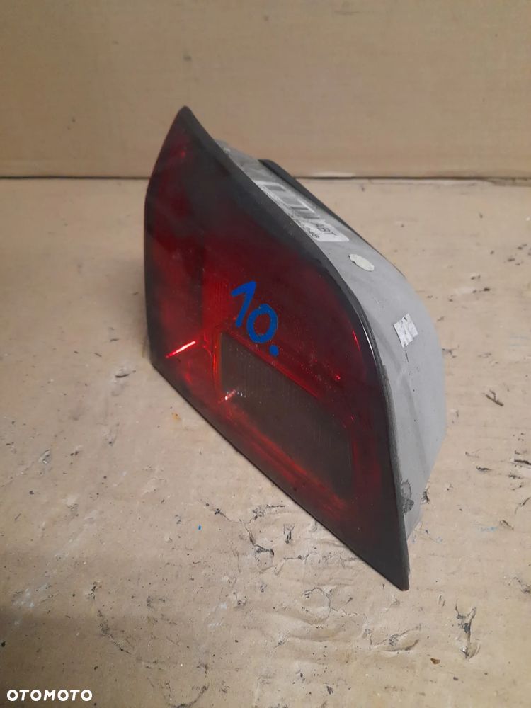 LAMPA LEWY TYŁ W KLAPĘ OPEL ASTRA J KOMBI nr 13314056 / 495056087 - 4
