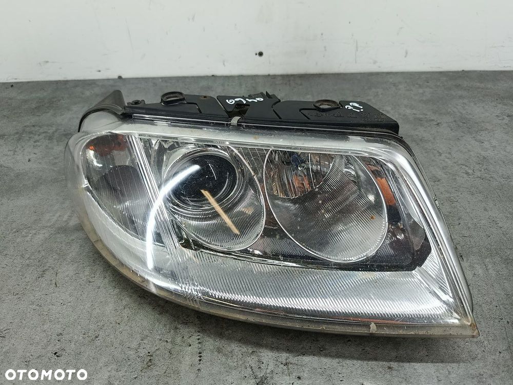 LAMPA PRZÓD PRAWA VW PASSAT B5 FL TYC - 1