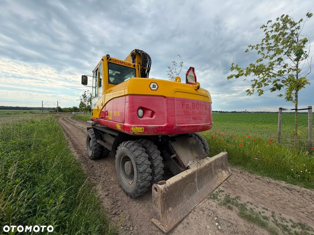 Caterpillar 313D - 4