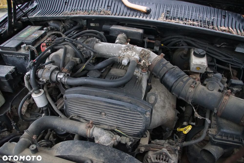 Auto na części - Kia Sportage I 2.0 DOHC 128 KM 4x4 1997R Silnik Skrzynia Drzwi Maska Klapa Drzwi Błotnik Zderzak Szyba Lusterko Klamka Lampa Deska Kokpit Sterownik Moduł Czujnik Licznik Panel - 19