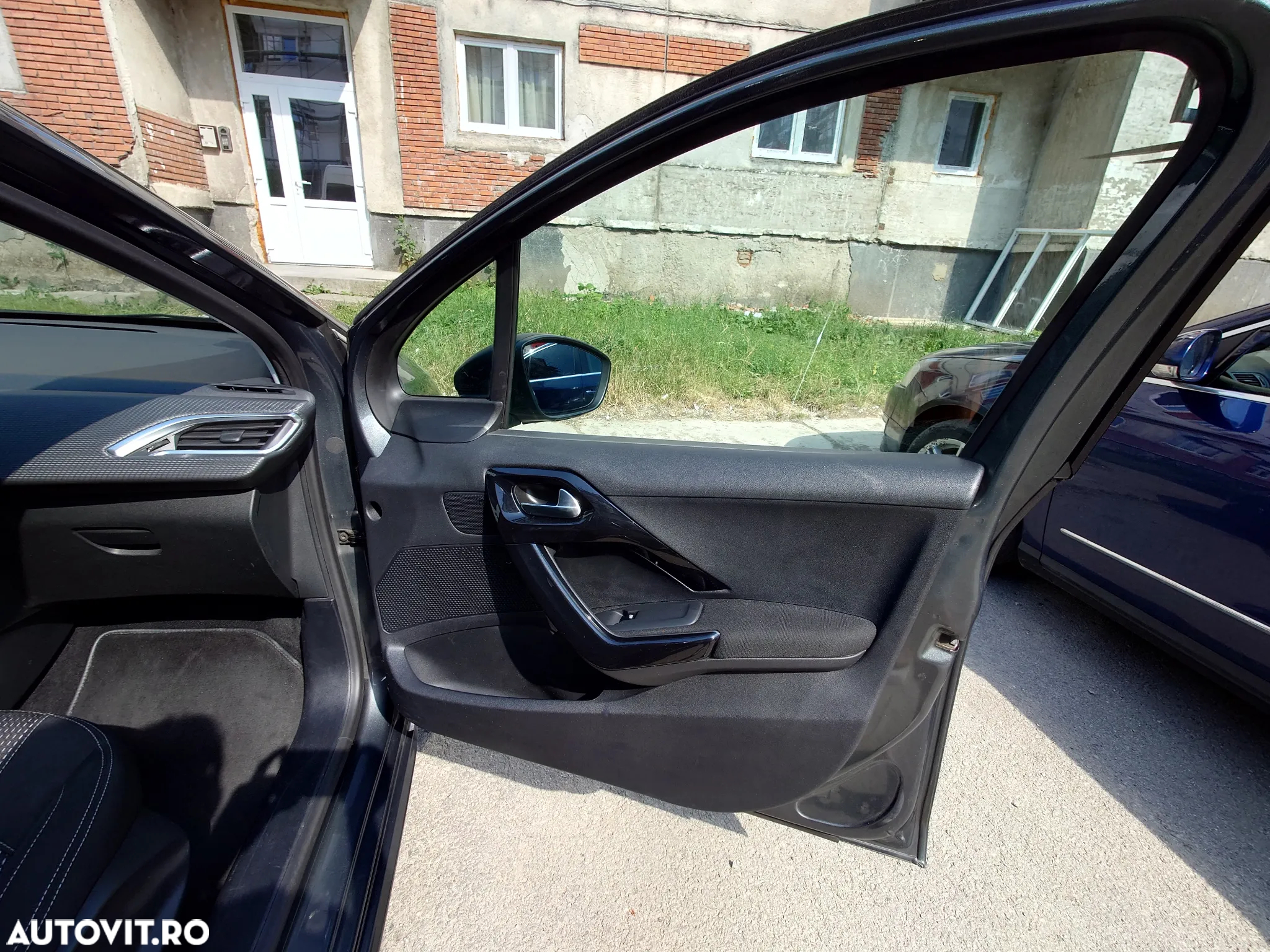 Peugeot 208 1.2 L PureTech Allure - 31