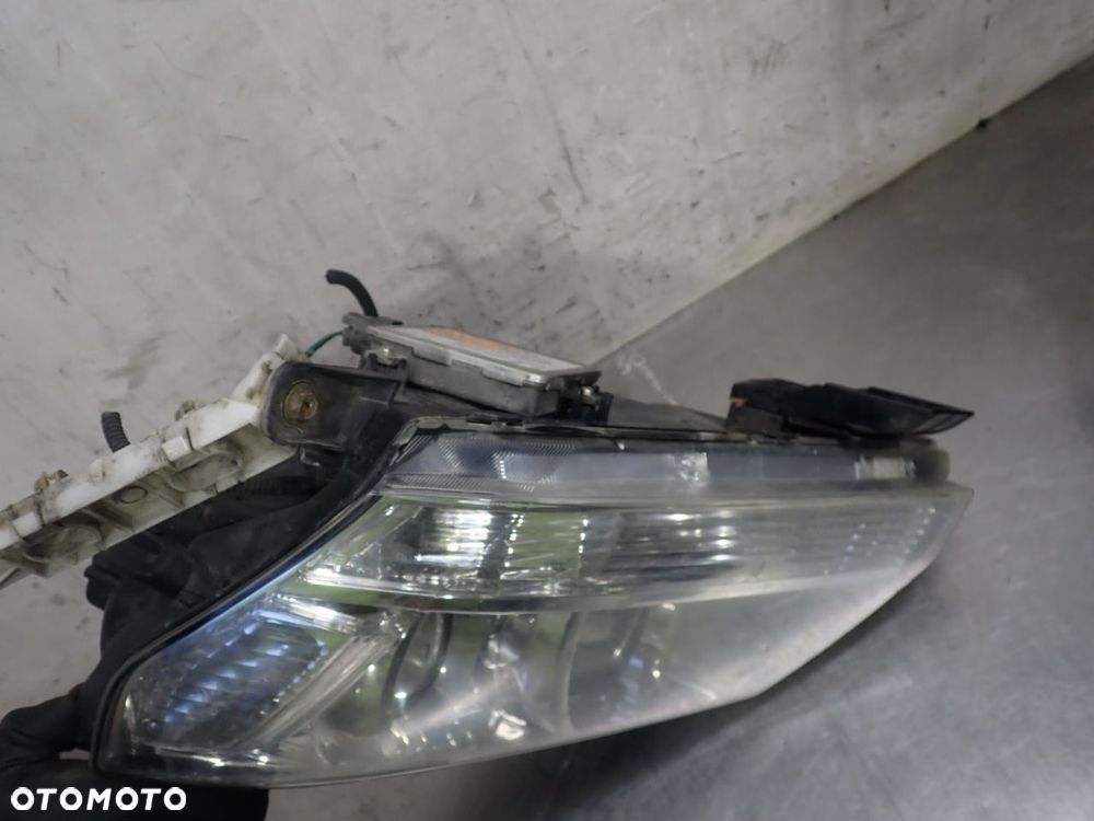 LAMPA LEWA PRZEDNIA XENON SUZUKI GRAND VITARA II 1.9 - 12