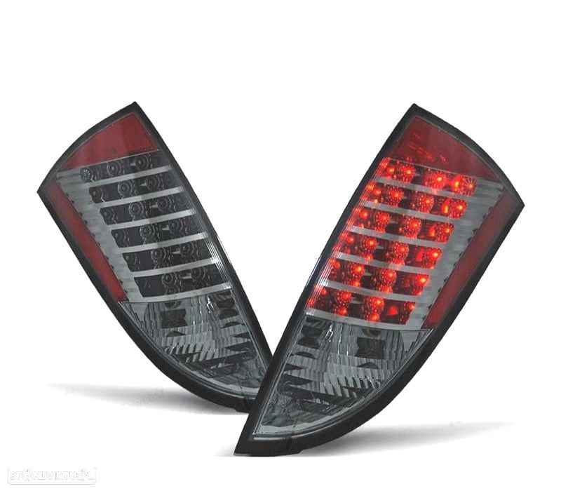 FAROLINS TRASEIROS LED PARA FORD FOCUS 98-04 ESCURECIDOS - 1